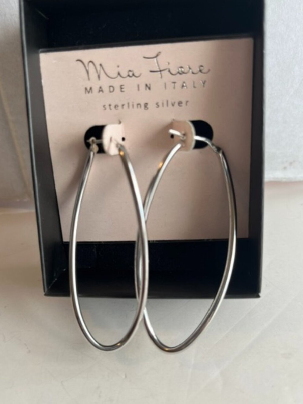 Mia Fiore sterling silver earrings.